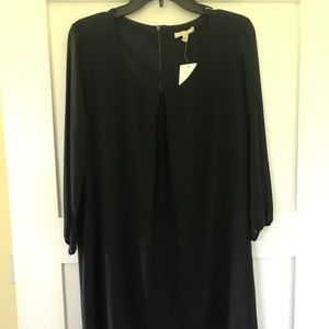 Black shift dress. 3/4 sleeve. Never worn.